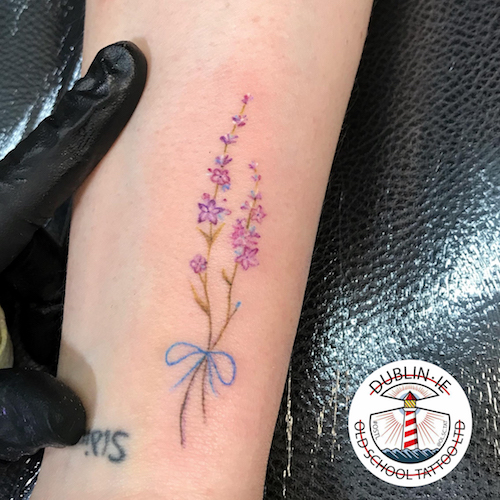 tiny flowers tattoo for girl